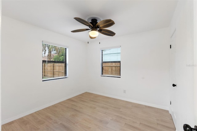 unfurnished room featuring ceiling fan and light hardwood / wood-style flooring