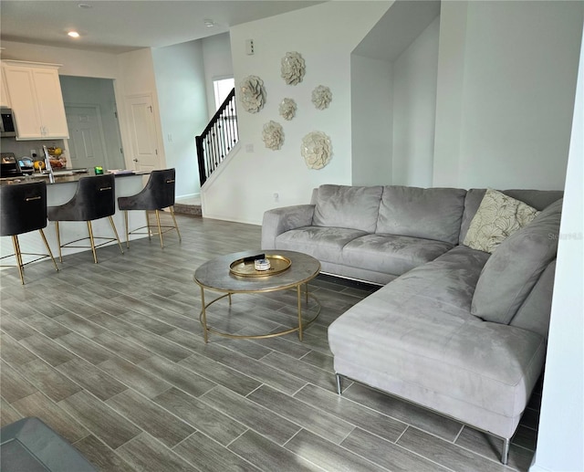 living room featuring dark hardwood / wood-style floors