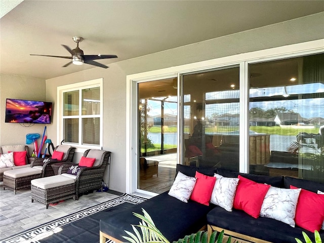 view of patio featuring ceiling fan