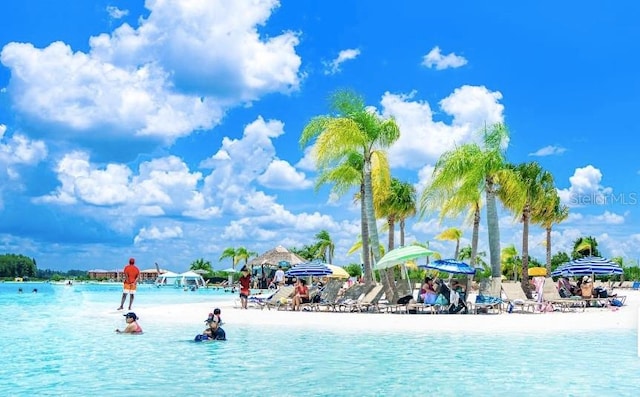 view of water feature with a beach view