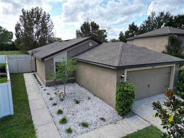 view of side of property featuring a garage