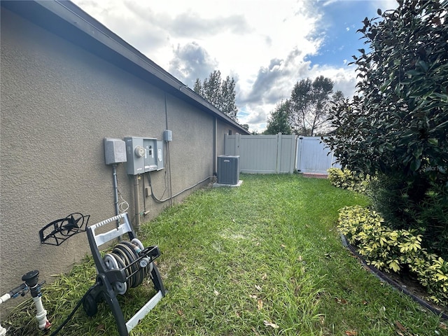 view of yard featuring central AC