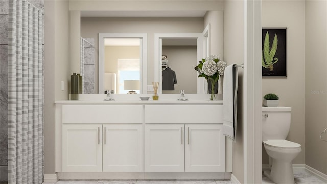 bathroom with vanity and toilet