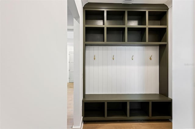 mudroom with hardwood / wood-style floors