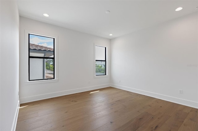 spare room with light wood-type flooring