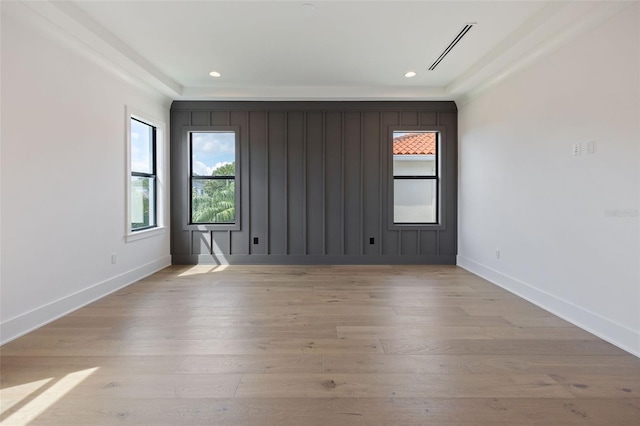 unfurnished room with light hardwood / wood-style flooring