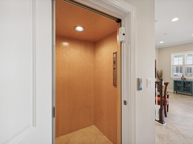 details with tile patterned flooring and elevator