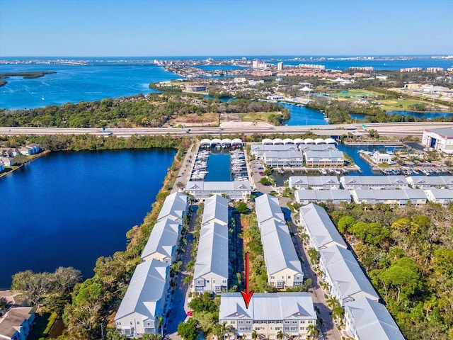 drone / aerial view with a water view