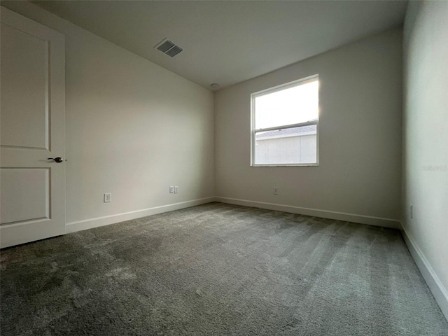 unfurnished room with carpet floors