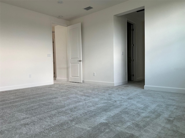 empty room with carpet floors