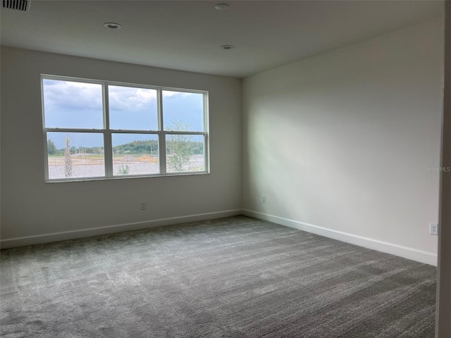 empty room with carpet floors