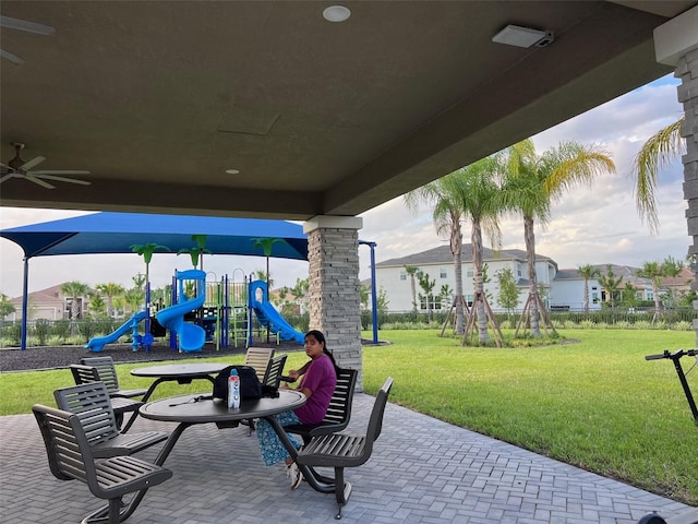 view of patio featuring a playground