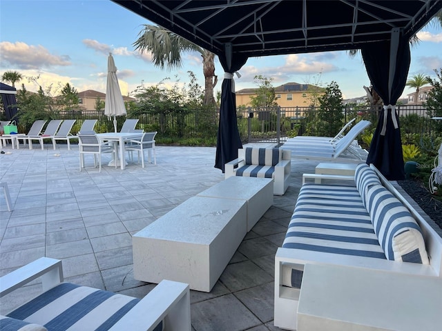 view of patio / terrace featuring a gazebo and an outdoor living space