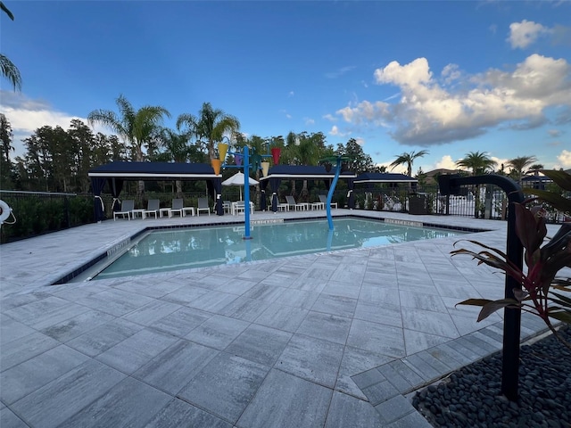 view of pool featuring a patio area