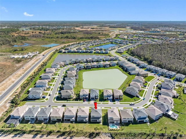 bird's eye view with a water view