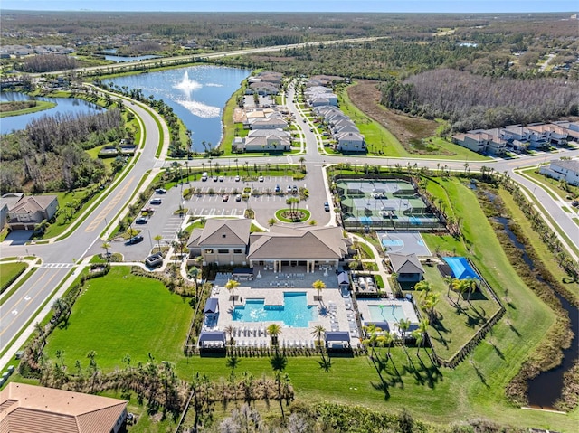 birds eye view of property featuring a water view