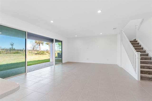 empty room featuring light tile patterned flooring