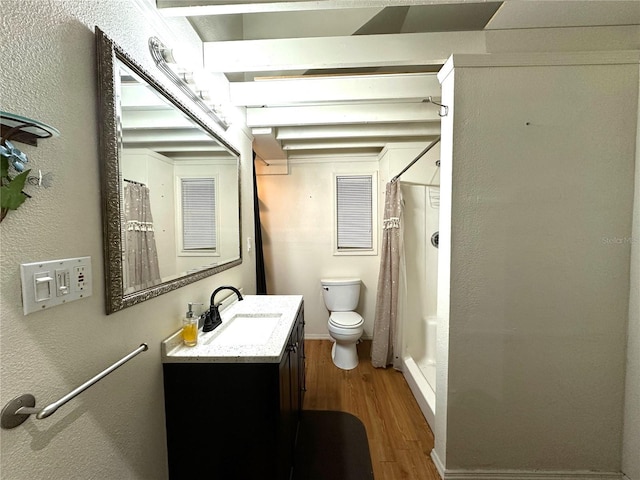 full bathroom with curtained shower, visible vents, toilet, vanity, and wood finished floors