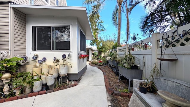 view of property exterior featuring fence