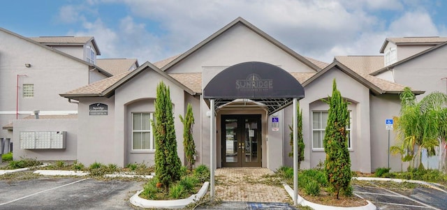 doorway to property featuring french doors