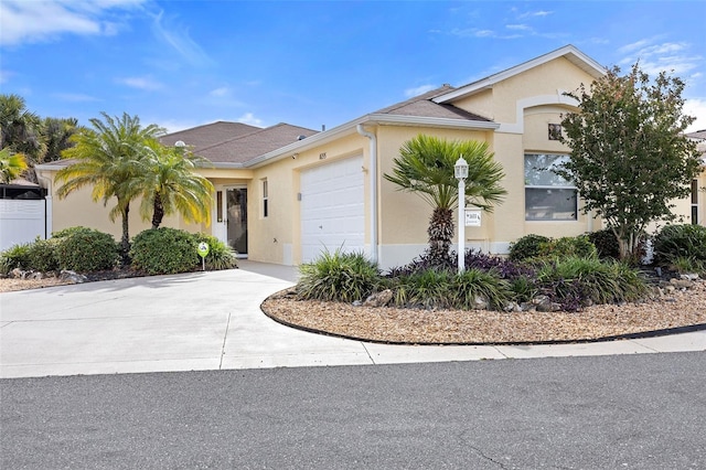 ranch-style home featuring a garage