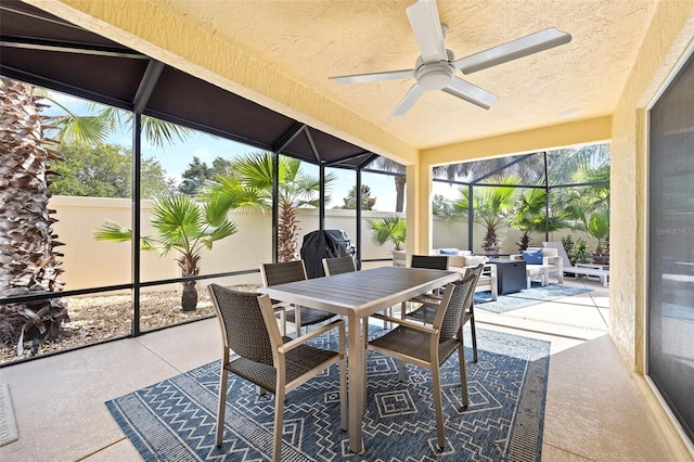 sunroom / solarium with ceiling fan