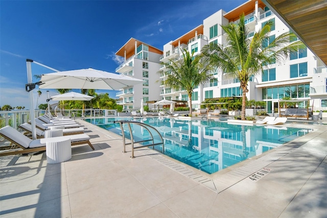 view of swimming pool with a patio