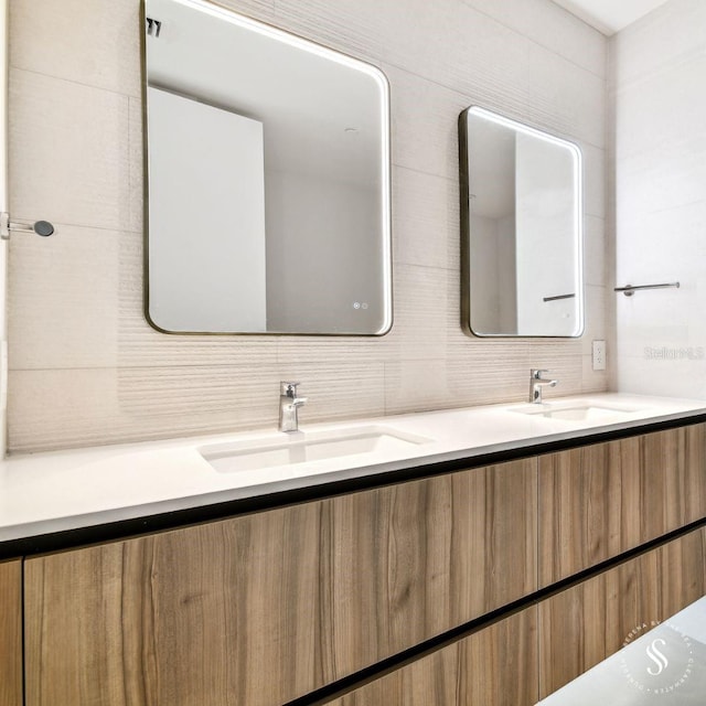 bathroom with vanity and backsplash