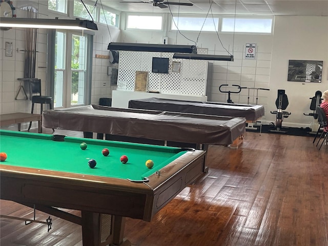 playroom featuring tile walls, billiards, and dark hardwood / wood-style flooring