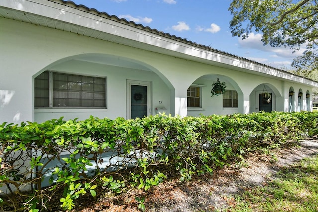 11200 102nd Ave Unit 33, Seminole, FL 33778 - entrance to property with stucco siding