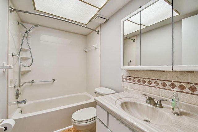 full bathroom with shower / bathing tub combination, vanity, and toilet