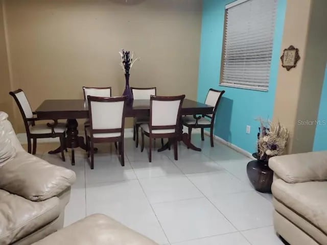 2001 Rain Dance Pl, Brandon, FL 33510 - dining area featuring light tile patterned floors and baseboards