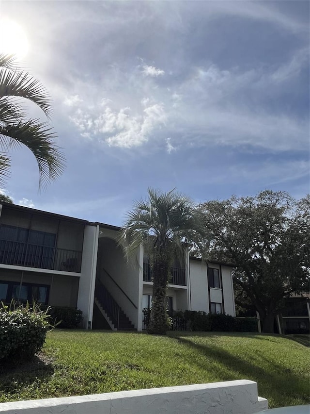 2688 Pine Ridge Way N Unit D1, Palm Harbor, FL 34684 - view of property with stairs
