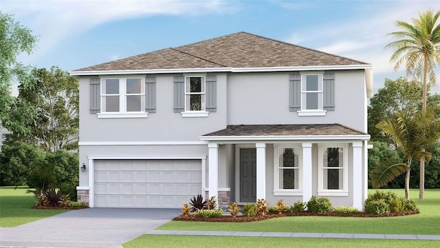 view of front facade with a front yard and a garage