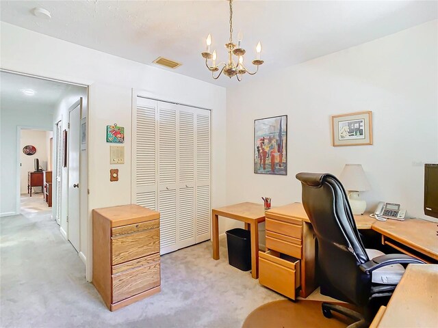 office space featuring light carpet and a chandelier