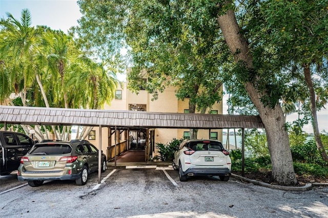 view of car parking with a carport