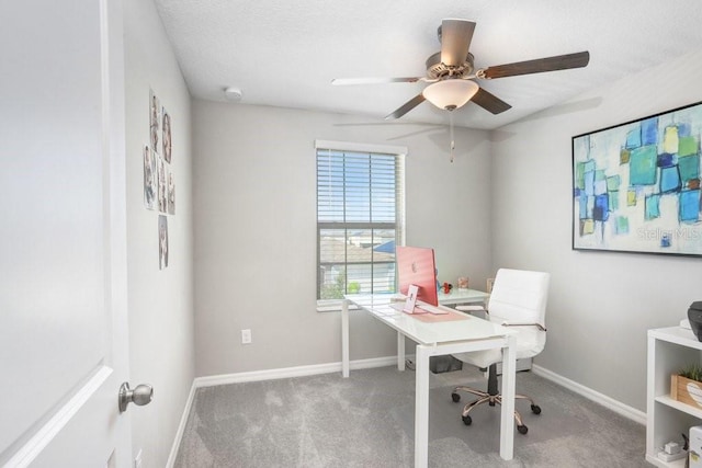 home office with carpet flooring and ceiling fan