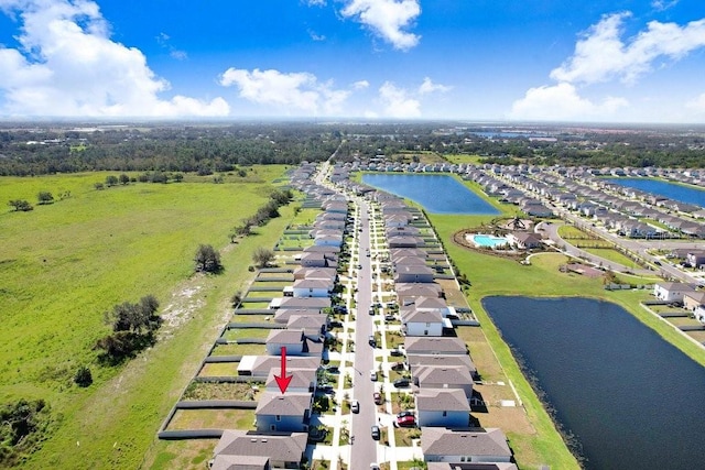 drone / aerial view featuring a water view