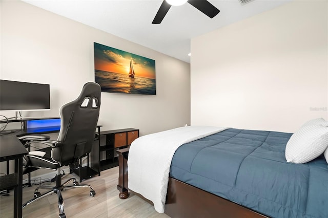 bedroom featuring ceiling fan and light hardwood / wood-style flooring