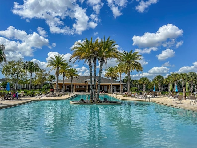 view of swimming pool with a patio area