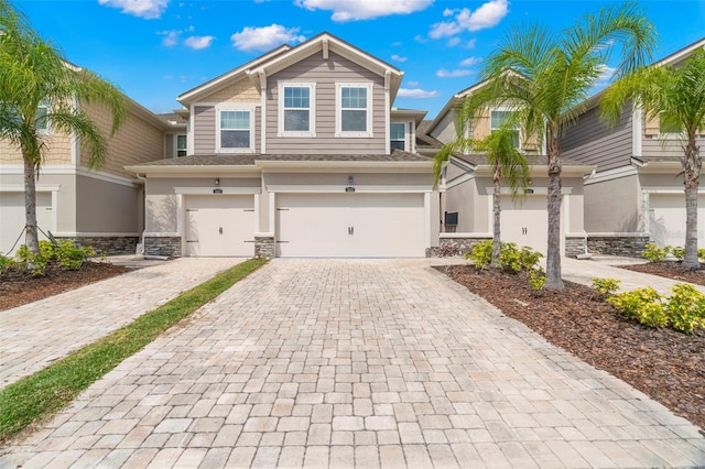 view of front of property with a garage