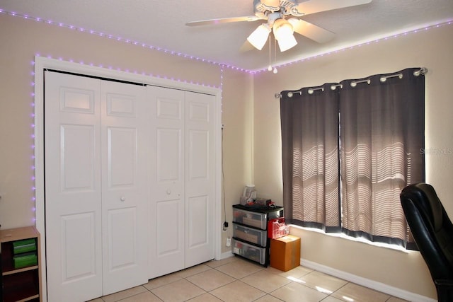 tiled office with ceiling fan