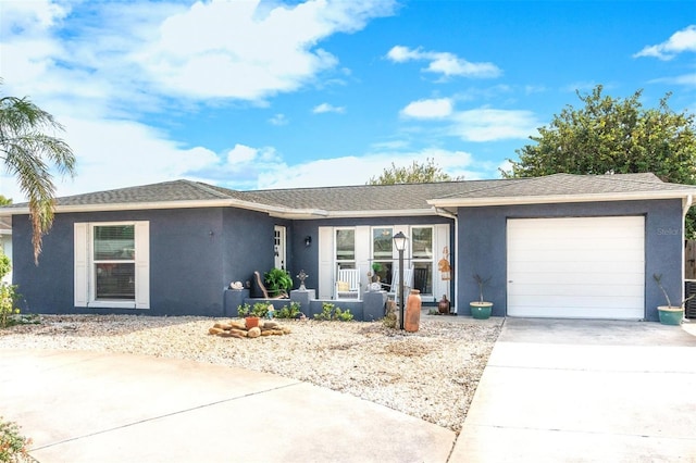 ranch-style home with a garage