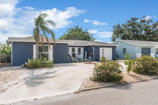 single story home featuring a garage