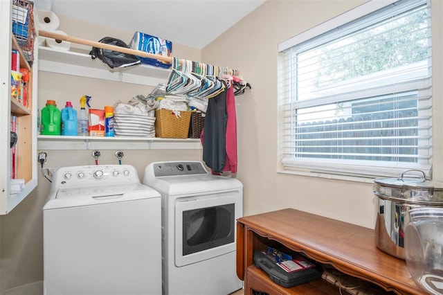 laundry room featuring washing machine and dryer