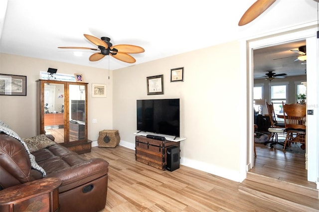 living room with light hardwood / wood-style flooring