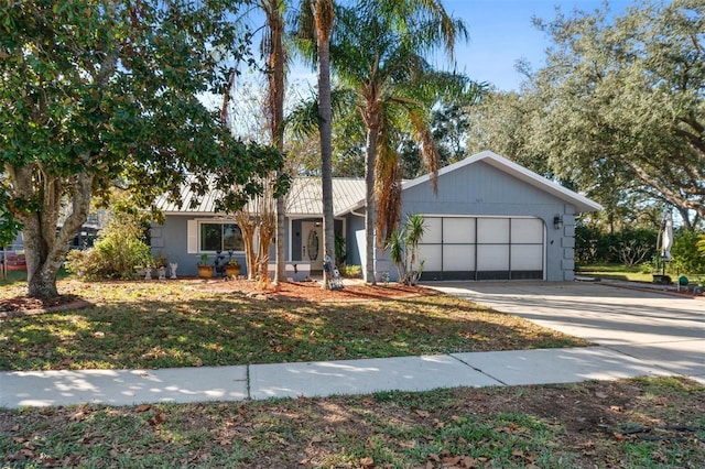 ranch-style home featuring a garage