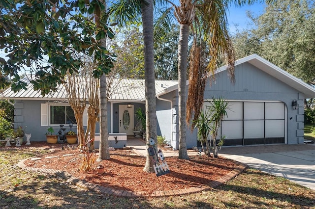 view of front of home with a garage