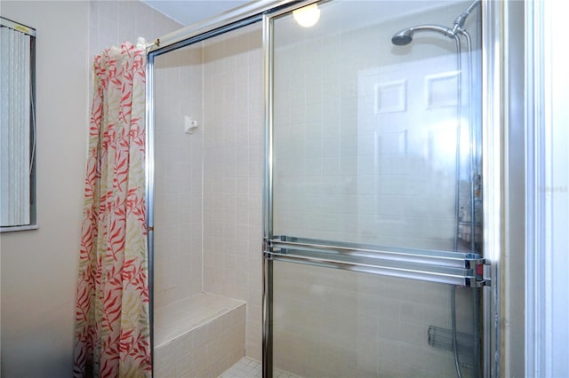 bathroom featuring a stall shower