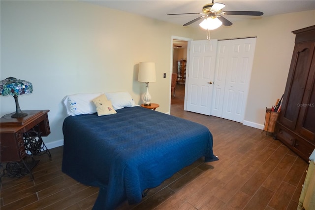 bedroom with ceiling fan, dark wood finished floors, and baseboards